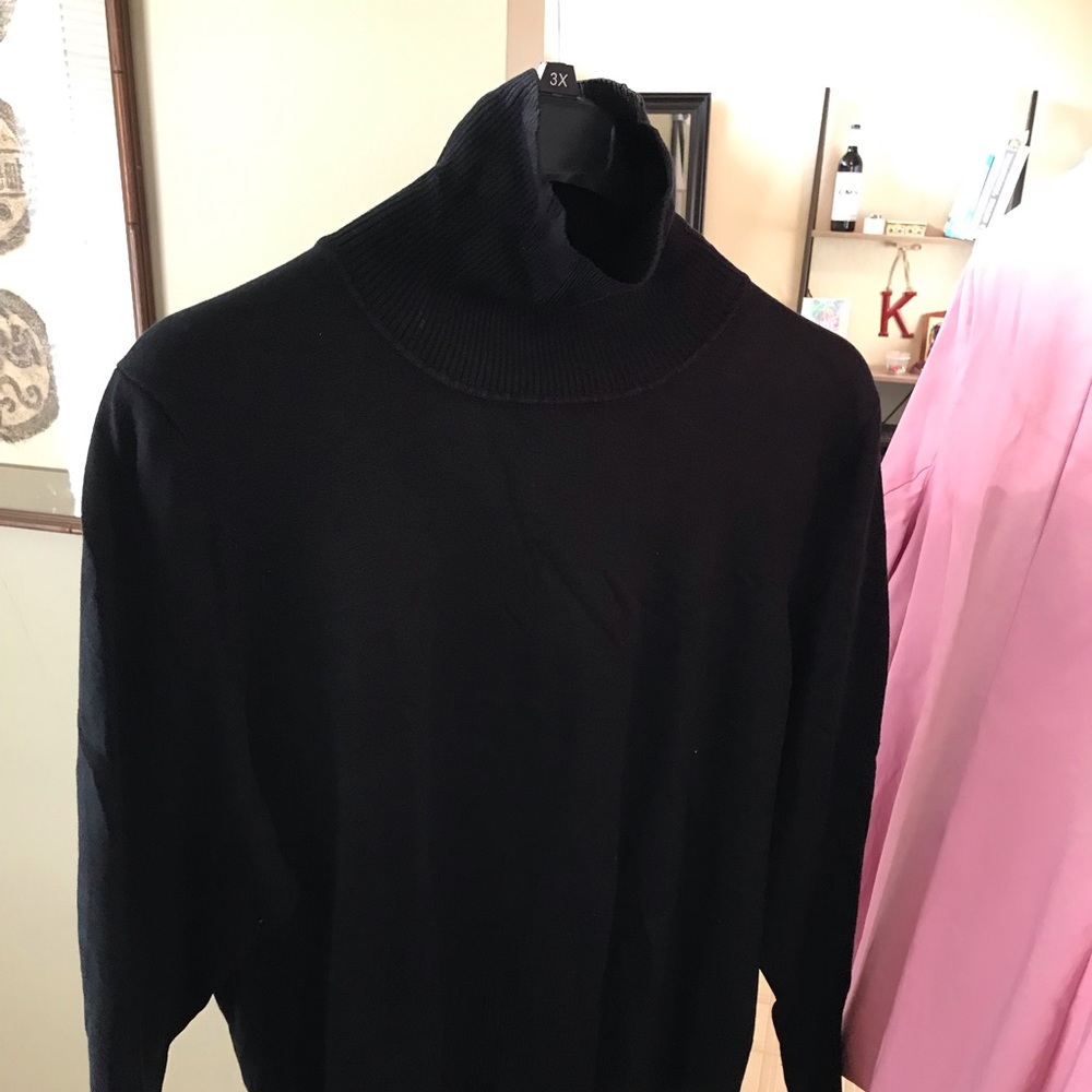 Black turtleneck sweater.